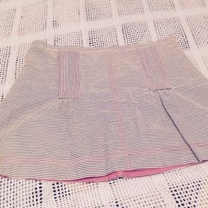 Adorable BCBG miniskirt with pink accent (size 2)
