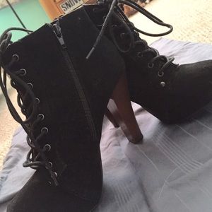 Black laced high heeled boots