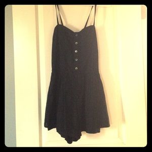 "I let loose" black Volcom jumpsuit.