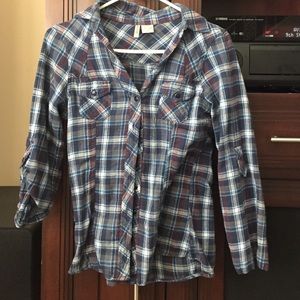brown, blue, and white flannel