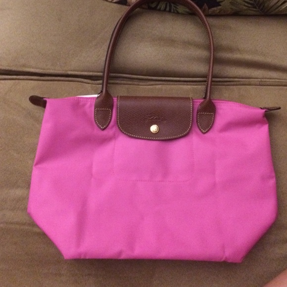 Longchamp Handbags - Pink mini long champ vinyl bag ONE HOUR SALE