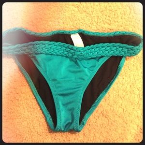 Teal braided bathing suit bottom.