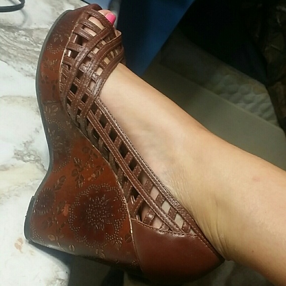 Brown with gold floral print on the heel
