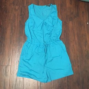 Sky blue romper with ruffle detail