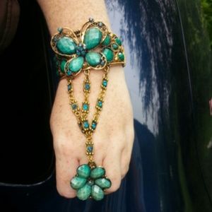 Butterfly cuff bracelet w/attatched flower ring.