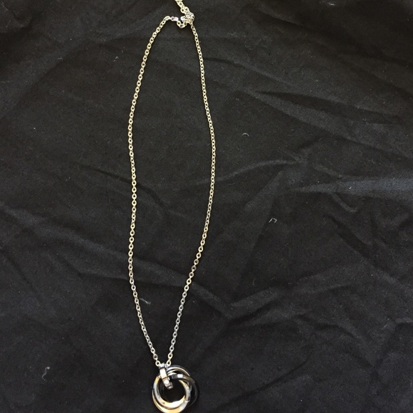 Silver necklace with multiple rings