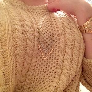 Pale gold cable knit sweater