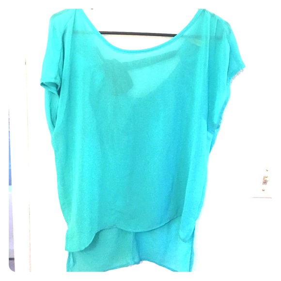 Teal blue blouse & black bow in the back