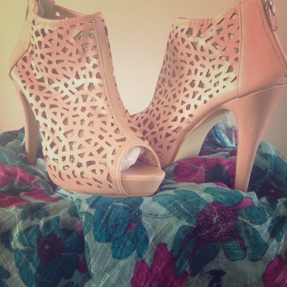 Ankle boot...I like to call , a touch of pink!!