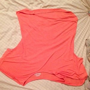 Orange miss shirt with holes in the sleeves
