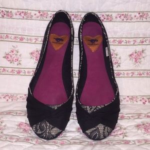 Lacy black flats