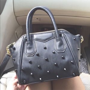 Black studded handbag