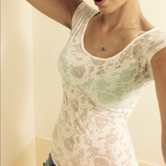 White, knit open back, skull top