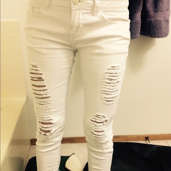 White ripped Jeans.