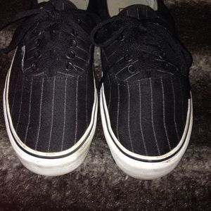 black vans with white pinstripes