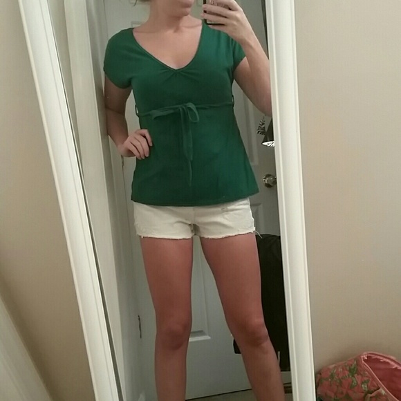 Green Charlotte Russe top with belt.