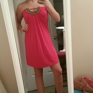 Pink dress with brown beading at top and cutout