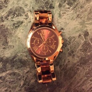 Brown and gold watch