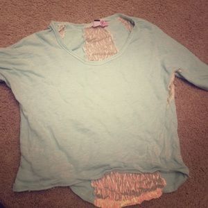 FRANCESCA'S pale sea green top with lace inserts