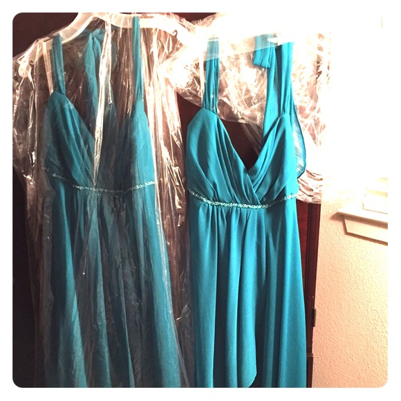 2 Teal dresses.