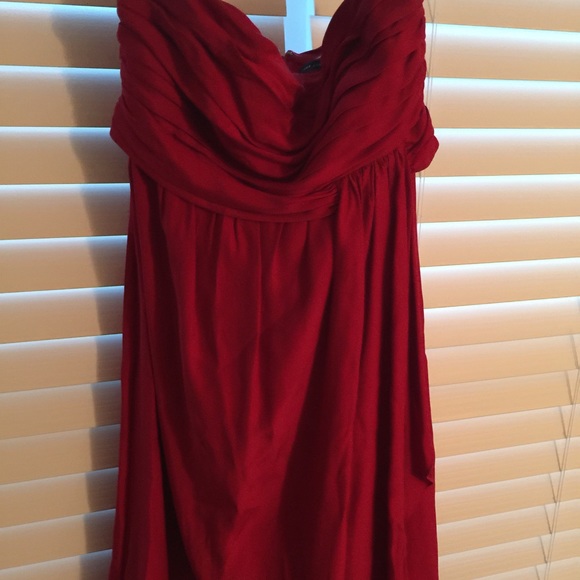 The limited red strapless silk dress