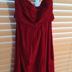 The limited red strapless silk dress