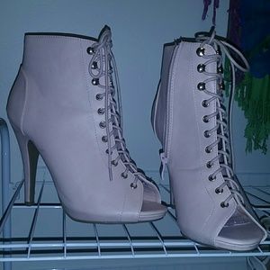 Pink lace up booties