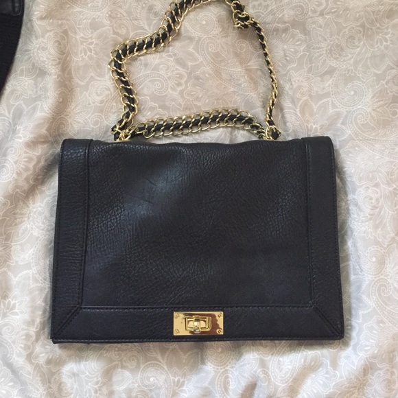 Black leather and gold handbag
