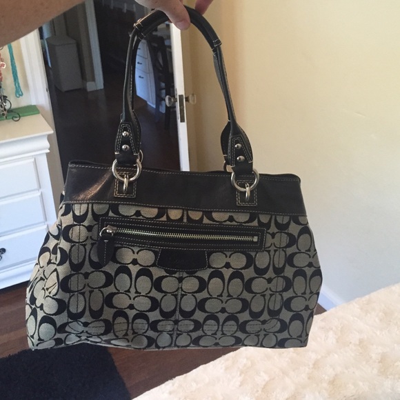 Black and gray Coach purse