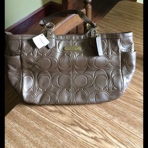 Coach copper leather hand bag