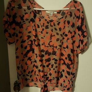 Really cute sheer  blouse.