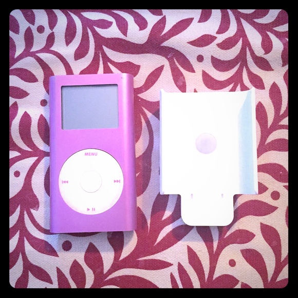 Pink 6GB iPod and holder