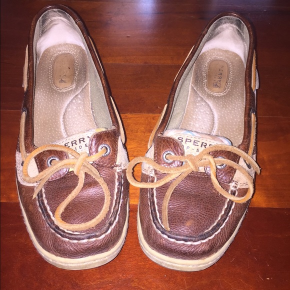 Women's Sperrys with plaid design. Size 7.5
