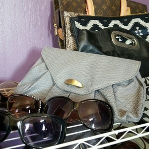 Grey faux snake skin clutch