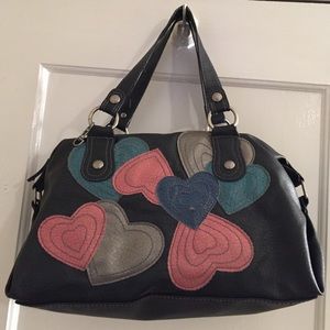 Black handbag with hearts