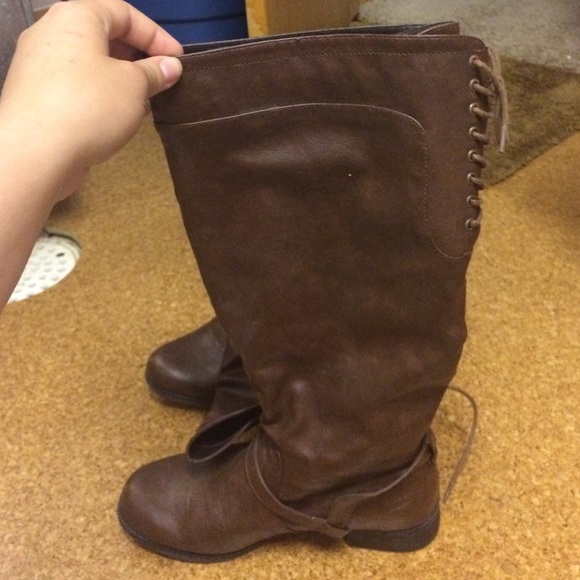 High boot with a half inch heel.