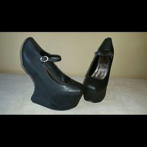 Black faux leather gravity heels