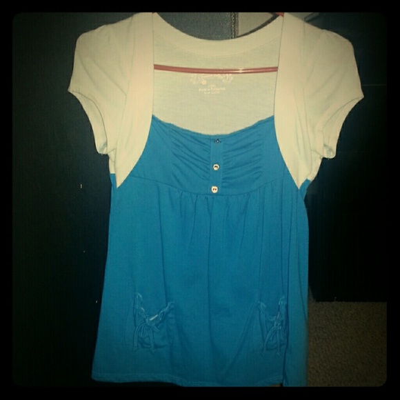 White and blue low neck cut top