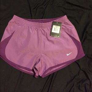 Purple Nike running shorts