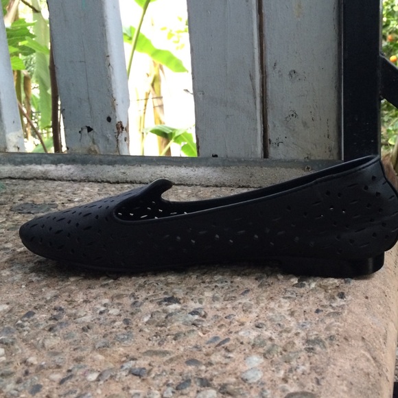These are black perforated leather loafers