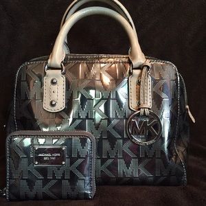 Authentic Michael Kors nickel mirror metallic