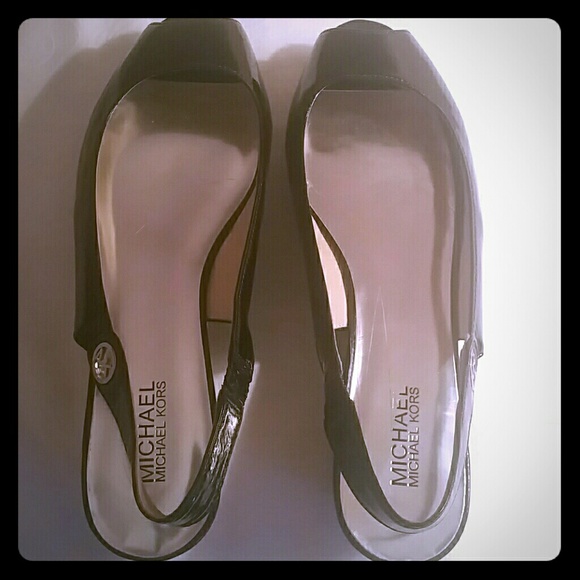 Black patent leather peeptoe slingbacks