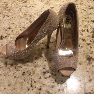 Nude shi by journeys pumps