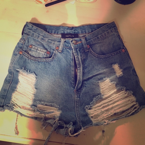 Ripped high-waisted denim shorts