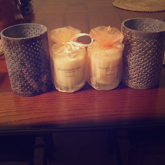 2 candle holders w candles. New. Pumpkin scent