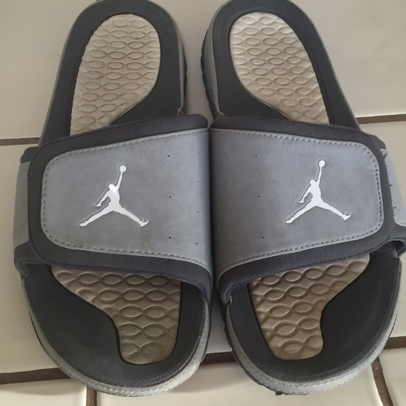 Used grey Nike sandals