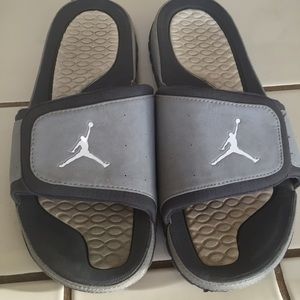 Used grey Nike sandals