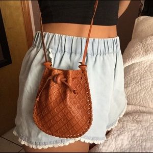 Small brown leather crossbody purse