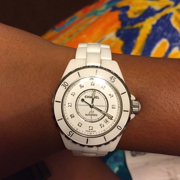 Chanel J12 Watch With Diamonds in face.