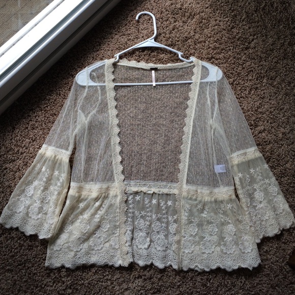 Poof! Small lace cardigan